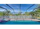 Enjoy this relaxing pool and spa with screened enclosure at 4762 Meredith Ln, Sarasota, FL 34241