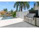 Modern outdoor kitchen with built-in grill and cabinetry at 5300 Avenida Del Mare, Sarasota, FL 34242