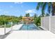 Modern pool and spa with waterfront views at 5300 Avenida Del Mare, Sarasota, FL 34242