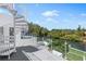 Modern spiral staircase with a stunning canal view at 5300 Avenida Del Mare, Sarasota, FL 34242