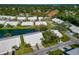 Aerial view of a villa near a lake at 5478 Kelly Dr # 7, Sarasota, FL 34233