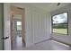 Spacious bedroom with large closet and backyard view at 59 Tee View Rd, Rotonda West, FL 33947