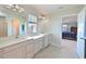 Bathroom boasts double sinks, and a view into the bedroom at 6107 116Th E Ave, Parrish, FL 34219