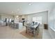 Open concept kitchen with stainless steel appliances and an island at 6107 116Th E Ave, Parrish, FL 34219