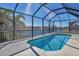 Enclosed heated pool with lake view at 6223 Champions Row St. St, Bradenton, FL 34210