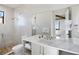 Elegant bathroom with marble vanity and walk-in shower at 741 Jacaranda Rd, Anna Maria, FL 34216