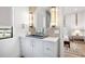 Modern bathroom with floating vanity and large mirror at 741 Jacaranda Rd, Anna Maria, FL 34216