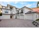 Luxury beachfront home with three-car garage and brick driveway at 741 Jacaranda Rd, Anna Maria, FL 34216