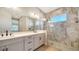 Modern bathroom with double vanity and walk-in shower at 10142 Crystal Isles Cir, Sarasota, FL 34241