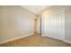 Bright bedroom with wood-look floors and closet at 10142 Crystal Isles Cir, Sarasota, FL 34241