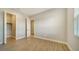 Spacious bedroom with wood-look tile floors and a large closet at 10142 Crystal Isles Cir, Sarasota, FL 34241