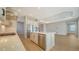 Modern kitchen with island, stainless steel appliances, and white cabinets at 10142 Crystal Isles Cir, Sarasota, FL 34241