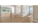 Open floor plan, light hardwood floors, access to backyard at 10142 Crystal Isles Cir, Sarasota, FL 34241