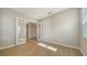 Office with glass french doors and wood-look tile flooring at 10142 Crystal Isles Cir, Sarasota, FL 34241