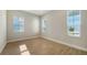 Bright office space with wood-look tile flooring and windows at 10142 Crystal Isles Cir, Sarasota, FL 34241