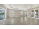 Bright dining room with sliding doors opening to backyard at 10300 Lake George Ave, Sarasota, FL 34241
