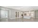 Open entryway with tile floors and view of kitchen at 10300 Lake George Ave, Sarasota, FL 34241