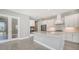 Modern kitchen with stainless steel appliances and white cabinetry at 10300 Lake George Ave, Sarasota, FL 34241