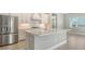Kitchen boasts stainless steel appliances and a large island at 10300 Lake George Ave, Sarasota, FL 34241