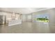 Open concept kitchen with stainless steel appliances and an island at 10300 Lake George Ave, Sarasota, FL 34241