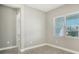 Spacious office with large window and neutral decor at 10300 Lake George Ave, Sarasota, FL 34241