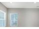 Bright office space with two windows and neutral walls at 10300 Lake George Ave, Sarasota, FL 34241