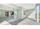 Covered patio with view of backyard and kitchen access at 10300 Lake George Ave, Sarasota, FL 34241