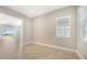 Bright study with tile flooring and view of backyard at 10300 Lake George Ave, Sarasota, FL 34241