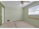 Bedroom with ceiling fan, window, and closet at 10307 Sandpiper W Rd, Bradenton, FL 34209