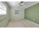 Bedroom with ceiling fan, window and closet at 10307 Sandpiper W Rd, Bradenton, FL 34209