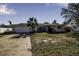 Single story home with attached garage and spacious front yard at 10307 Sandpiper W Rd, Bradenton, FL 34209