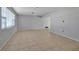 Bright and airy living room with tile flooring and neutral walls at 10307 Sandpiper W Rd, Bradenton, FL 34209