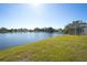 Expansive lakefront view from the backyard, providing a serene setting at 11116 Marigold Dr, Lakewood Ranch, FL 34202