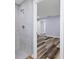 Modern bathroom with marble shower and grey hex floor at 12302 Tangier St, North Port, FL 34287