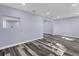 Spacious open area with gray vinyl plank floors at 12302 Tangier St, North Port, FL 34287