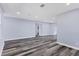 Open concept living area with hardwood floors and neutral walls at 12302 Tangier St, North Port, FL 34287