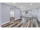 Open living area with hardwood-style floors and recessed lighting at 12302 Tangier St, North Port, FL 34287