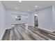 Open concept living area with hardwood floors and neutral walls at 12302 Tangier St, North Port, FL 34287