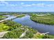 Aerial view of the community, showcasing its waterfront location and bridge access at 12721 20Th E St, Parrish, FL 34219