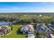 Aerial view of single-Gathering home with water access and conservation lot at 12721 20Th E St, Parrish, FL 34219