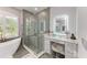 Bathroom featuring a soaking tub, shower, and vanity with a makeup counter at 13951 Wood Duck Cir, Lakewood Ranch, FL 34202