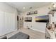 Bonus room offering a beverage center, wall-mounted televisions, and plenty of space at 13951 Wood Duck Cir, Lakewood Ranch, FL 34202