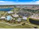 Expansive aerial view of a community with lakes, golf courses, tennis courts, and beautifully landscaped grounds at 15603 Derna Ter, Bradenton, FL 34211