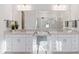 Beautiful bright bathroom with a double vanity, a makeup area, and modern fixtures at 15603 Derna Ter, Bradenton, FL 34211