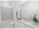 All-white bathroom featuring vanity, bathtub and shower combination at 15603 Derna Ter, Bradenton, FL 34211