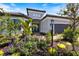 Attractive single-story home featuring manicured landscaping and a neutral color scheme at 15603 Derna Ter, Bradenton, FL 34211