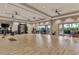 Bright and airy fitness studio with wood flooring, perfect for yoga and other fitness activities at 15603 Derna Ter, Bradenton, FL 34211