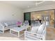 Spacious lanai with comfortable seating area and seamless flow to the indoor living spaces at 15603 Derna Ter, Bradenton, FL 34211