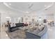 An expansive living room merges into a kitchen and dining area, perfect for gatherings at 15603 Derna Ter, Bradenton, FL 34211