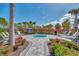 Relaxing spa with loungers and landscaping at 15603 Derna Ter, Bradenton, FL 34211